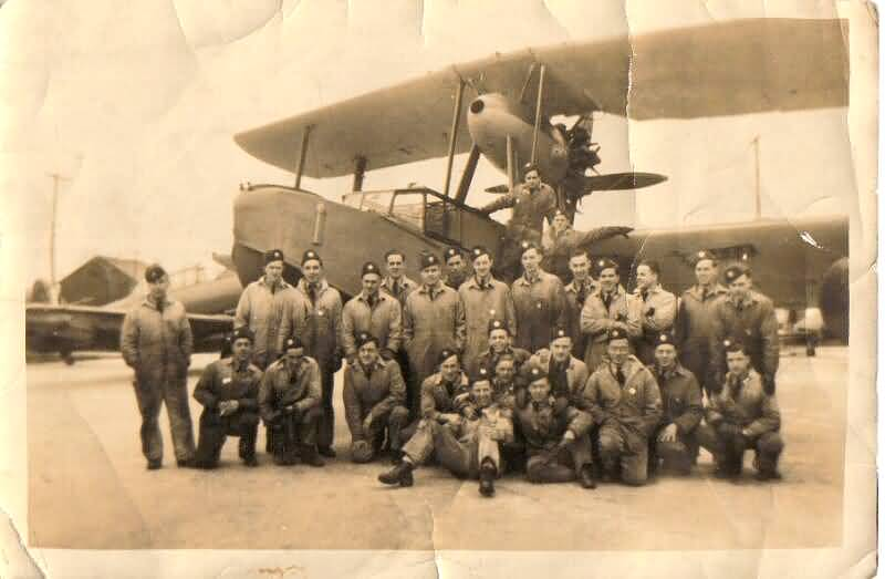 Louis Jerrald Longeway (1921-1994) is the one kneeling at the far right (facing the photo) Louis Jerrald Longeway (1921-1994) is the one kneeling at the far right (facing the photo)